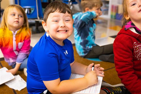 Students inside their classrooms learning. 